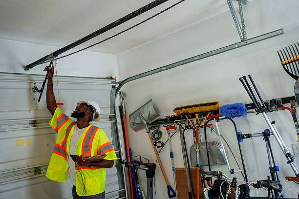 Professional Garage Door Panel Replacement technician working in Yadkin County County, NC